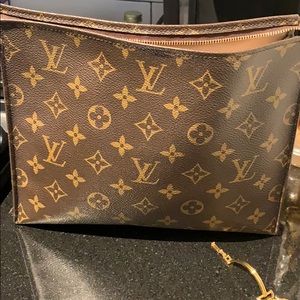 - Louis Vuitton clutch - authentic